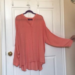 Sheer peach colored blouse
